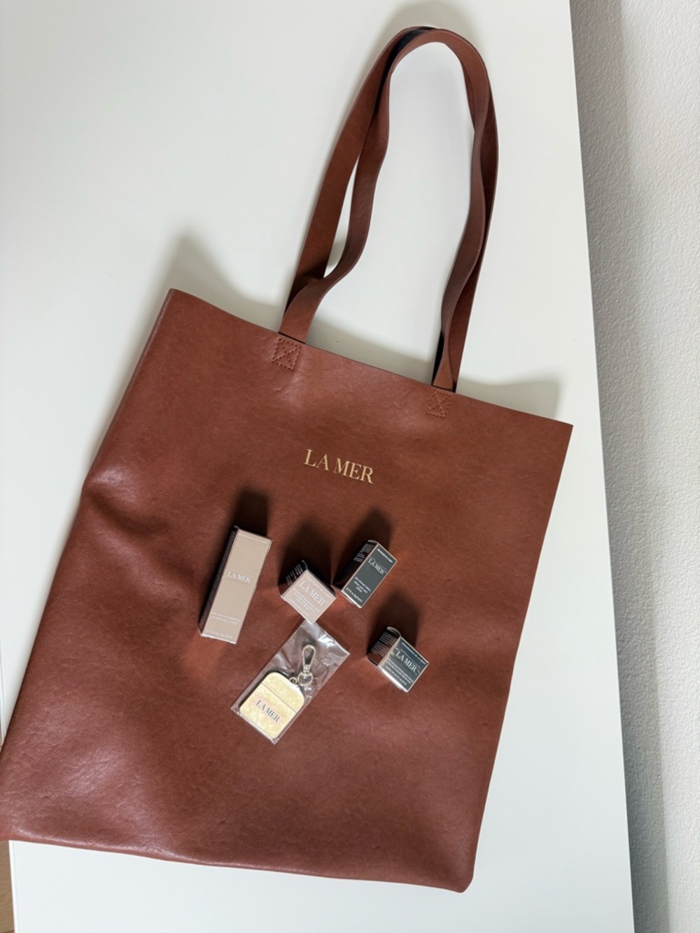 La Mer Brown Tote with Gold Logo